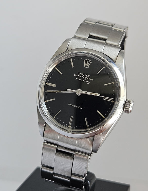Front picture Rolex Oyster Perpetual Airking 5500 vintage with black dial
