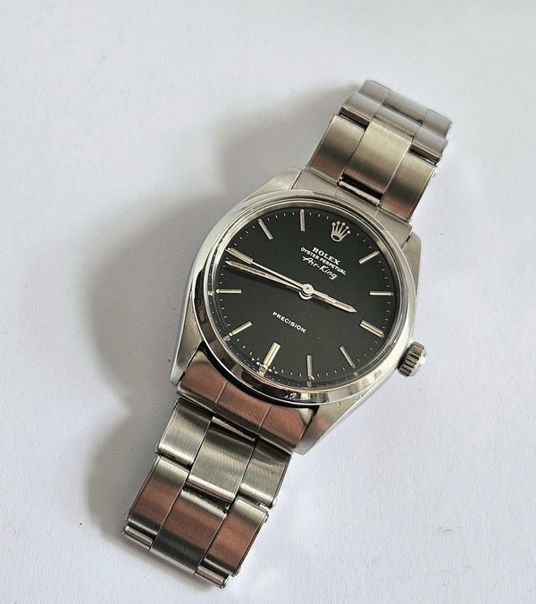 Rolex 5500 with black dial and stainless steel bracelet - front